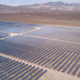 An aerial photo of a field full of solar panels in California.